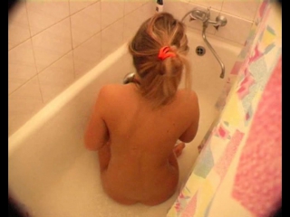 spies on a young girl who takes a shower